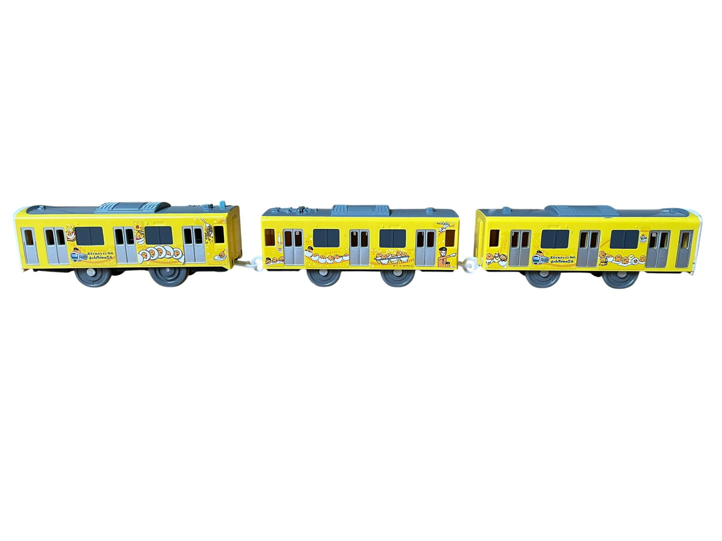 TOMY PLARAIL - SEIBU BAUREIHE 30000 "SMILE TRAIN" (GUDETAMA LACKIERUNG) - BATTERIEBETRIEBEN - GEBRAUCHT - JAPAN-IMPORT