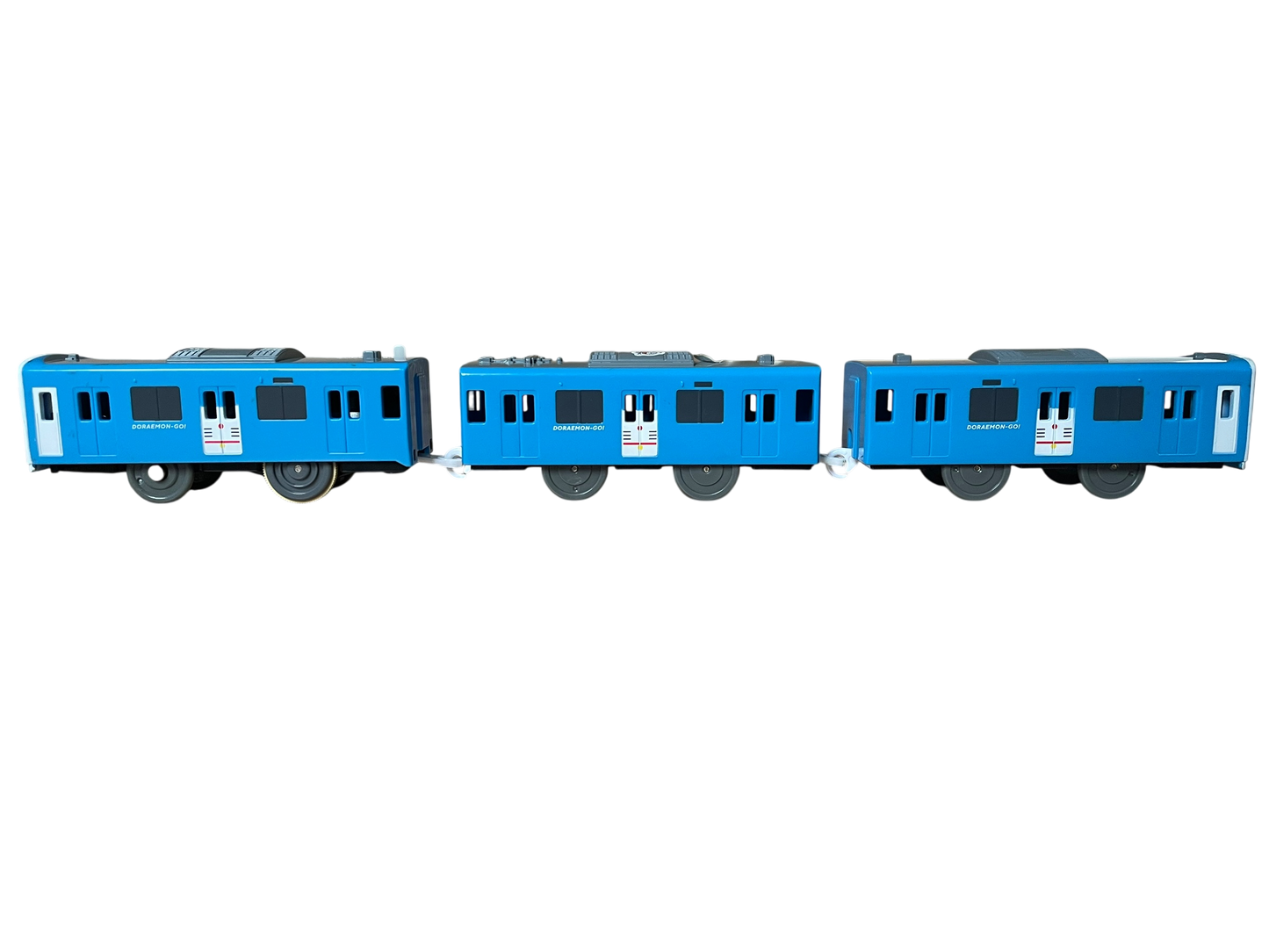 TOMY PLARAIL - SEIBU BAUREIHE 30000 "SMILE TRAIN" (DORAEMON LACKIERUNG) - BATTERIEBETRIEBEN - GEBRAUCHT - JAPAN-IMPORT