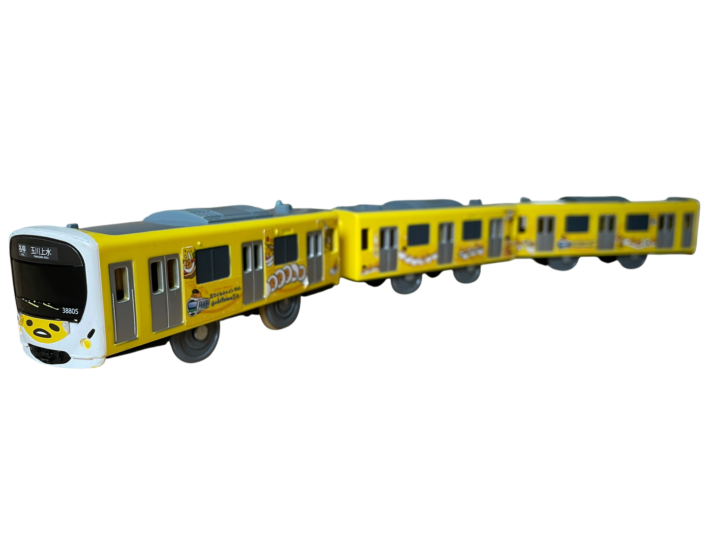 TOMY PLARAIL - SEIBU BAUREIHE 30000 "SMILE TRAIN" (GUDETAMA LACKIERUNG) - BATTERIEBETRIEBEN - GEBRAUCHT - JAPAN-IMPORT